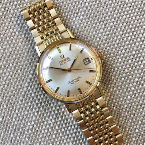 gold Omega Seamaster watch vintage